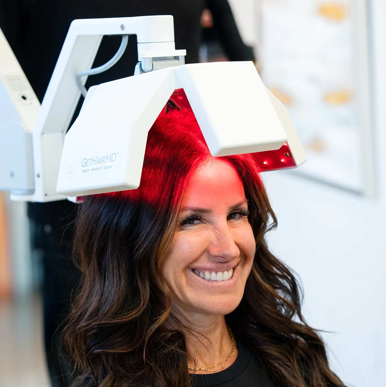 close up of woman receiving hair loss treatment
