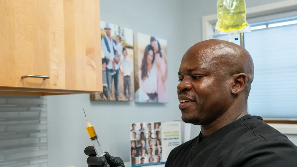 Patient receiving IV therapy at Neaman Wellness Center in Salem, OR